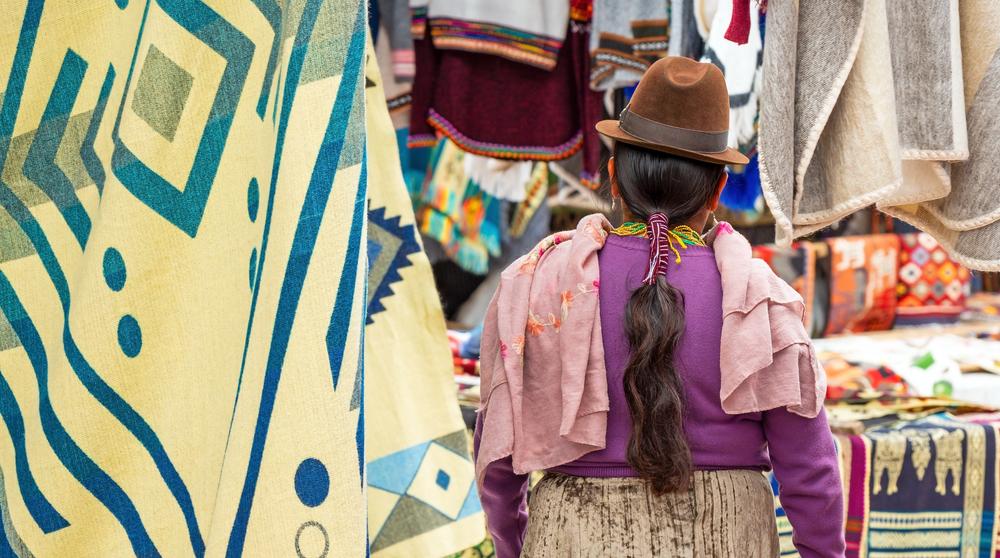 Ecuadorian indigenous woman from Otavalo wearing traditional clothing, Ecuador