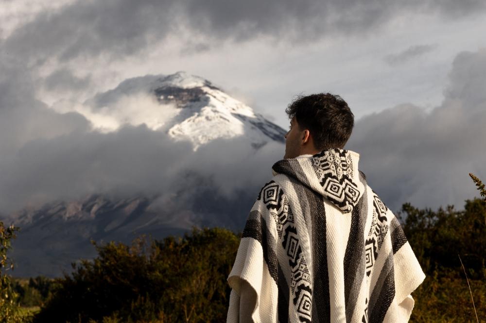 Ecuadorian with poncho, Cotopaxi Volcano, Ecuador.