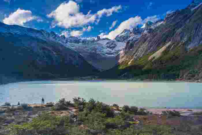 Emerald glacial lake surrounded by rugged mountains in Tierra del Fuego National Park