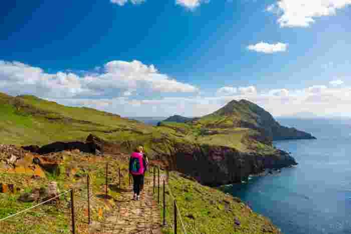 Tourists,On,Hiking,Path,On,Ponta,De,Sao,Lourenco,Madeira Tourists on a hiking path along the coast of Madeira Island, Portugal