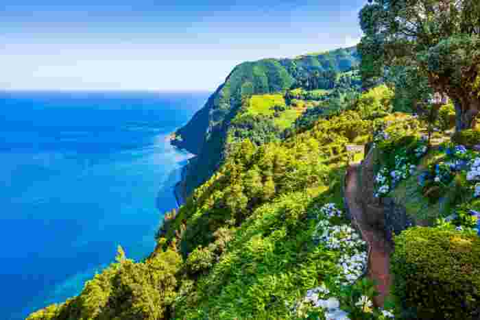 Coastal,Path,Along,Ocean,In,Ponta,Do,Sossego,Tropical,Gardens, Coastal path along the Atlantic Ocean on a Portuguese island